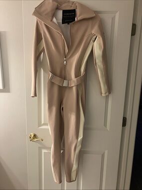 Cordova Women's Baby Pink Ski Onezie with Cream Side Panels and Belt